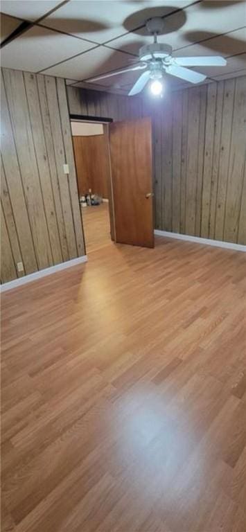 9 Octavia St, Providence, RI 02909 - finished basement with wood finished floors, wood walls, and ceiling fan