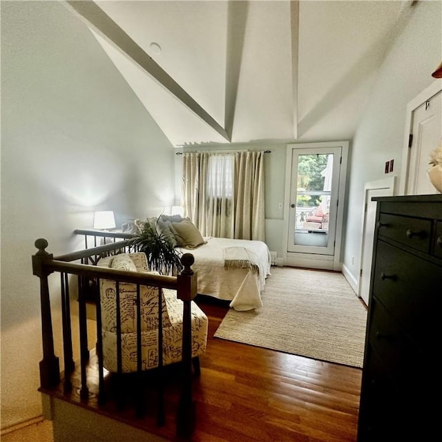 446 Bellevue Ave Unit 6, Newport, RI 02840 - bedroom featuring vaulted ceiling, access to exterior, and wood finished floors