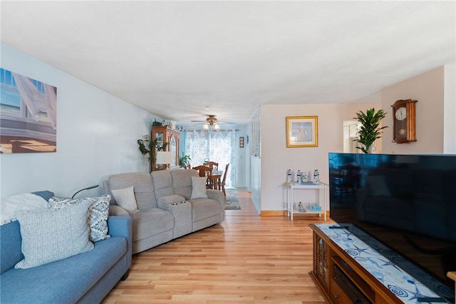 17 Cedar Dr, West Warwick, RI 02893 - living area featuring light wood-style flooring and a ceiling fan