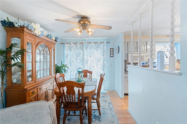 17 Cedar Dr, West Warwick, RI 02893 - dining area featuring a ceiling fan and light wood-style flooring