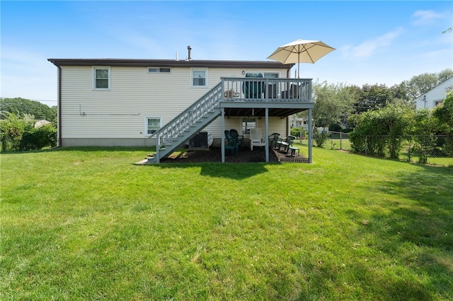 17 Cedar Dr, West Warwick, RI 02893 - rear view of house with stairs and a wooden deck