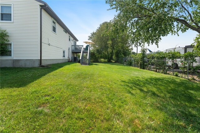 17 Cedar Dr, West Warwick, RI 02893 - view of yard with stairway and a wooden deck
