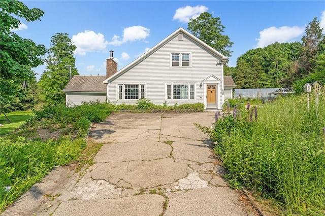 214 Highland Rd, Tiverton, RI 02878 - view of front of property featuring a chimney