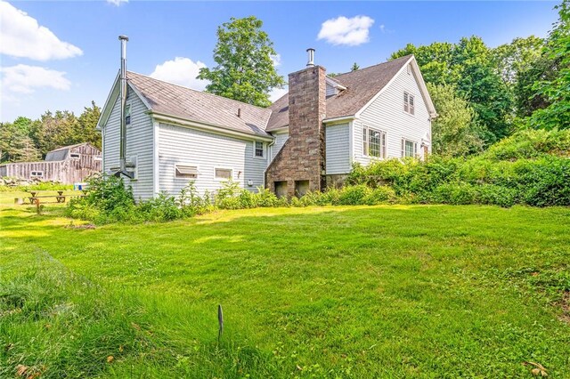 214 Highland Rd, Tiverton, RI 02878 - back of property with a chimney and a yard