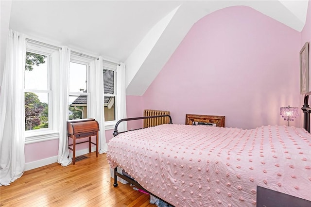214 Highland Rd, Tiverton, RI 02878 - bedroom featuring vaulted ceiling, light wood-style floors, and multiple windows
