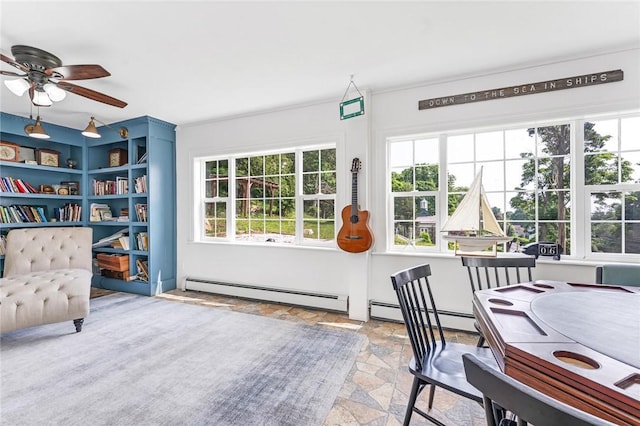 214 Highland Rd, Tiverton, RI 02878 - office area featuring stone tile flooring, a baseboard heating unit, plenty of natural light, and a ceiling fan