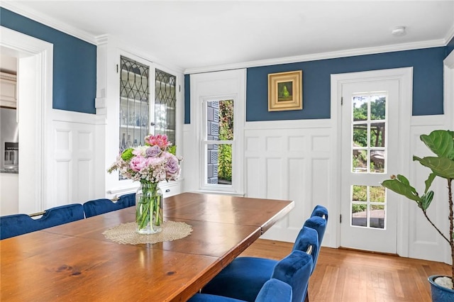 214 Highland Rd, Tiverton, RI 02878 - dining area with a decorative wall, ornamental molding, and a wainscoted wall