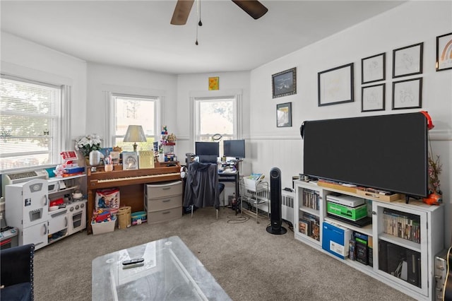 233 Waterman Ave, East Providence, RI 02914 - home office with a ceiling fan, carpet flooring, and wainscoting
