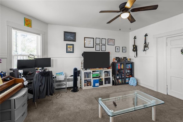 233 Waterman Ave, East Providence, RI 02914 - carpeted home office with a ceiling fan, wainscoting, and a decorative wall