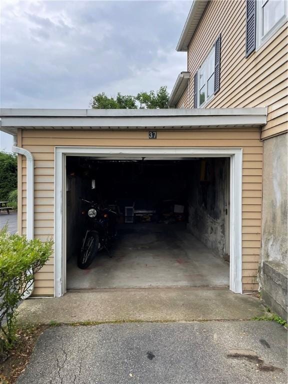 37 Kermit St, Woonsocket, RI 02895 - garage with asphalt driveway