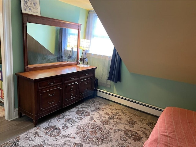 37 Kermit St, Woonsocket, RI 02895 - bedroom featuring baseboard heating and wood finished floors
