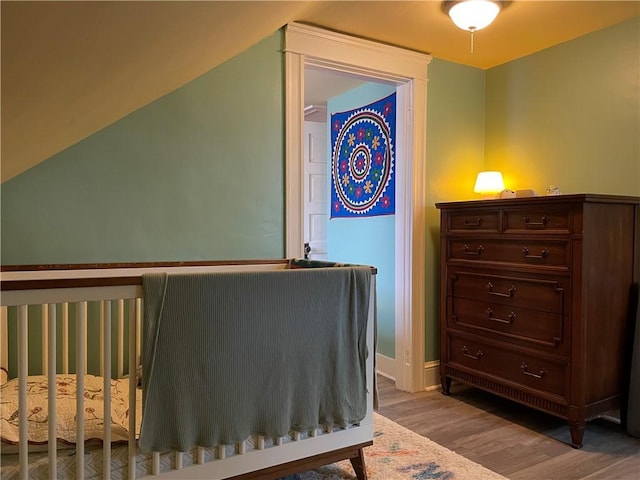 37 Kermit St, Woonsocket, RI 02895 - bedroom featuring wood finished floors and lofted ceiling