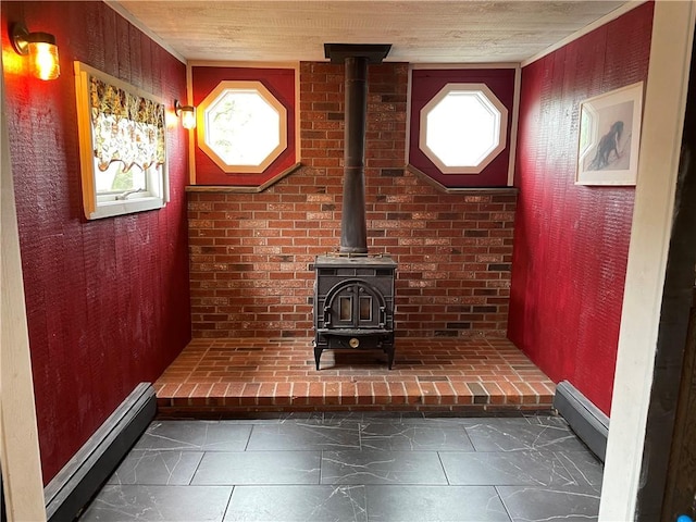 37 Kermit St, Woonsocket, RI 02895 - detailed view of a wood stove and baseboard heating