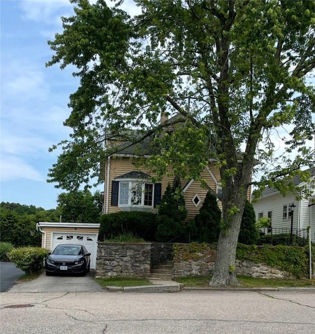 37 Kermit St, Woonsocket, RI 02895 - view of front of property featuring driveway and a chimney