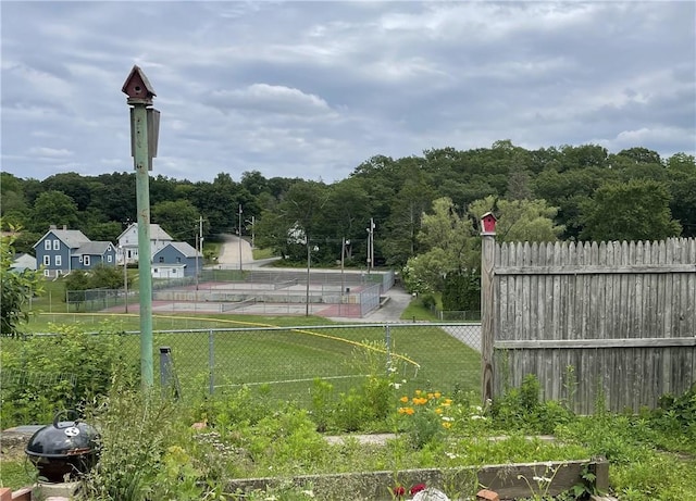37 Kermit St, Woonsocket, RI 02895 - view of property's community featuring a forest view