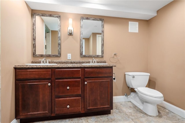 1 Tupperware Dr Unit 231, North Smithfield, RI 02896 - bathroom featuring baseboards and double vanity