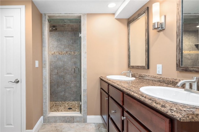 1 Tupperware Dr Unit 231, North Smithfield, RI 02896 - bathroom featuring a shower stall, double vanity, and recessed lighting