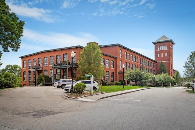 1 Tupperware Dr Unit 231, North Smithfield, RI 02896 - view of building exterior featuring uncovered parking