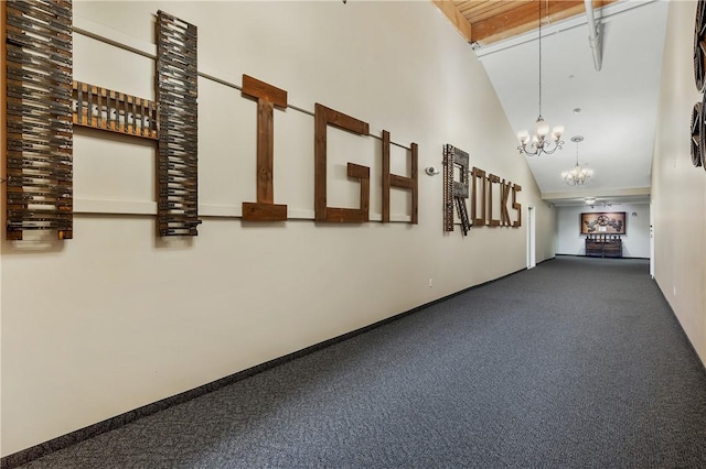 1 Tupperware Dr Unit 231, North Smithfield, RI 02896 - corridor featuring a high ceiling, a chandelier, and carpet flooring