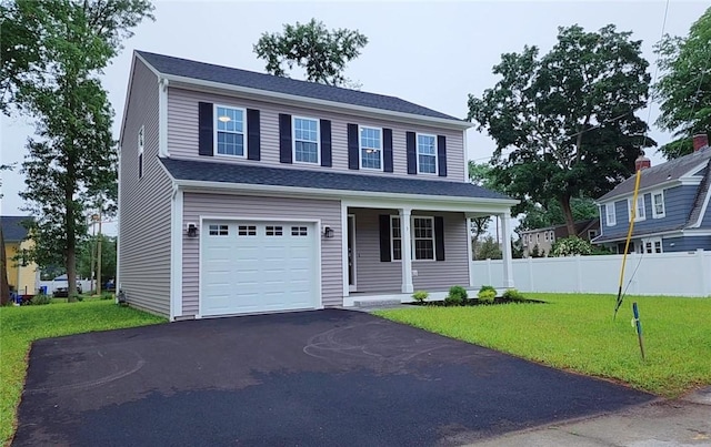 3 Sutcliffe Ave, Lincoln, RI 02865 - view of front facade with asphalt driveway, a garage, and a porch