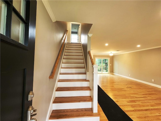 3 Sutcliffe Ave, Lincoln, RI 02865 - stairway featuring crown molding, wood finished floors, and recessed lighting
