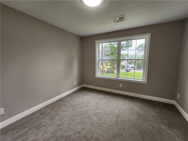 3 Sutcliffe Ave, Lincoln, RI 02865 - spare room featuring baseboards and dark carpet
