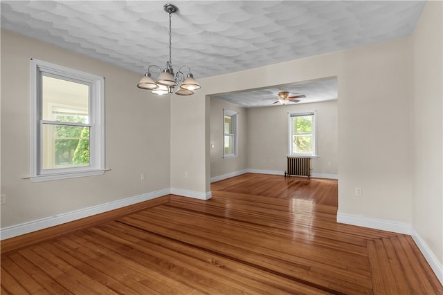 35 Inman Ave, Warwick, RI 02886 - unfurnished room with radiator heating unit, a chandelier, hardwood / wood-style floors, and ceiling fan