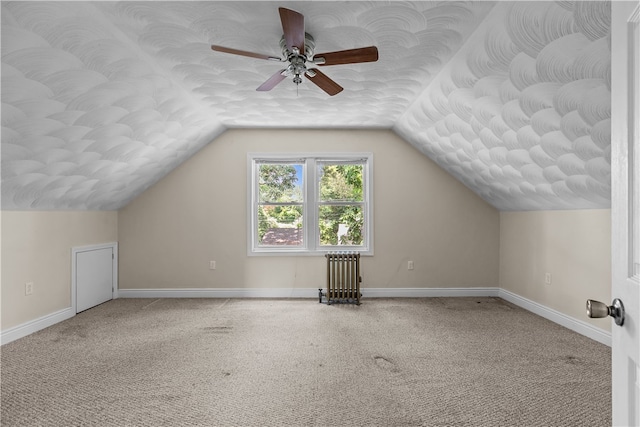 35 Inman Ave, Warwick, RI 02886 - bonus room featuring radiator heating unit, lofted ceiling, a ceiling fan, and carpet floors
