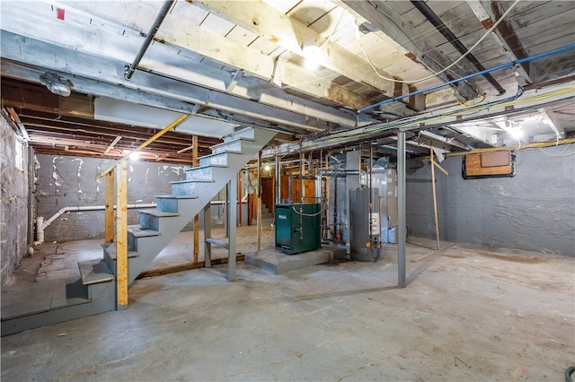 35 Inman Ave, Warwick, RI 02886 - unfinished basement featuring gas water heater, stairs, and a heating unit