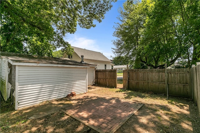 35 Inman Ave, Warwick, RI 02886 - view of yard featuring a patio and a shed