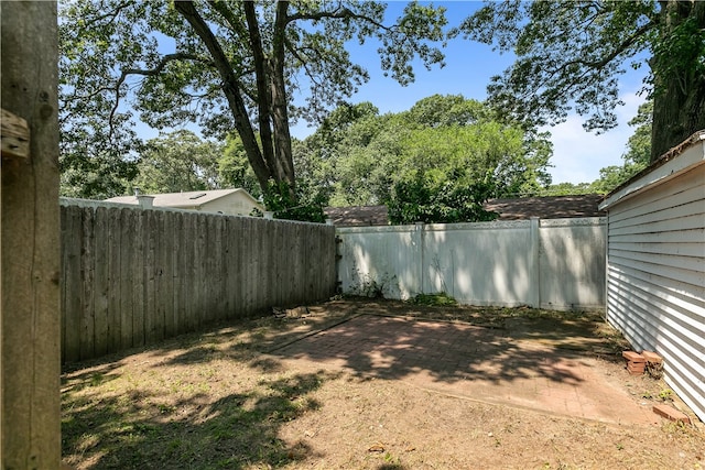 35 Inman Ave, Warwick, RI 02886 - fenced yard with a patio