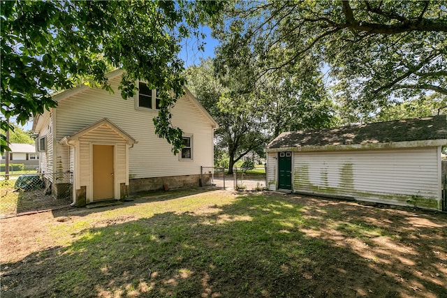 35 Inman Ave, Warwick, RI 02886 - back of property featuring an outbuilding and a gate