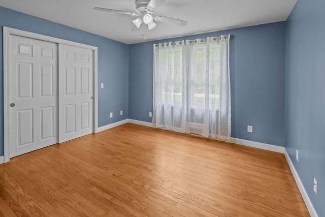 22 Oakridge Rd, Scituate, RI 02857 - unfurnished bedroom featuring wood finished floors, a closet, and ceiling fan