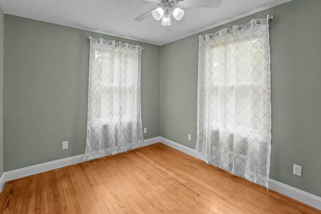 22 Oakridge Rd, Scituate, RI 02857 - empty room featuring ceiling fan and wood finished floors