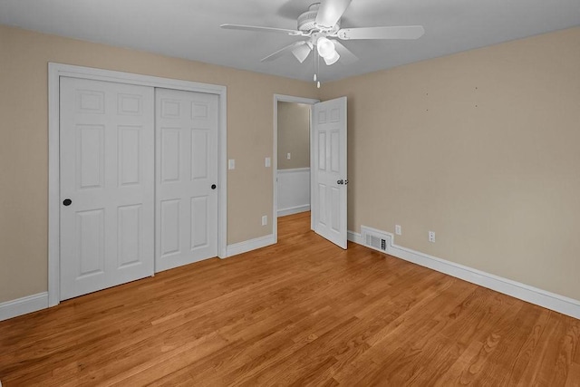 22 Oakridge Rd, Scituate, RI 02857 - unfurnished bedroom featuring light wood-style floors, a closet, and ceiling fan