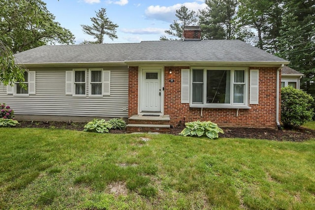 22 Oakridge Rd, Scituate, RI 02857 - view of front of property featuring a chimney, a front lawn, and roof with shingles