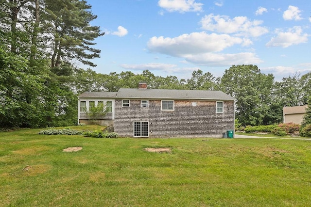 22 Oakridge Rd, Scituate, RI 02857 - back of house featuring a lawn and a chimney