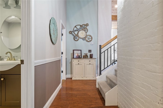 1 Tupperware Dr Unit 115, North Smithfield, RI 02896 - hall with dark wood finished floors and stairs