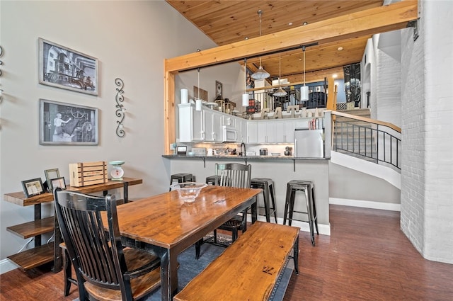 1 Tupperware Dr Unit 115, North Smithfield, RI 02896 - dining area with dark wood-type flooring, wooden ceiling, and stairway