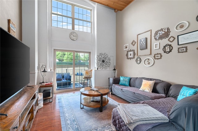 1 Tupperware Dr Unit 115, North Smithfield, RI 02896 - living room featuring a towering ceiling and wood finished floors