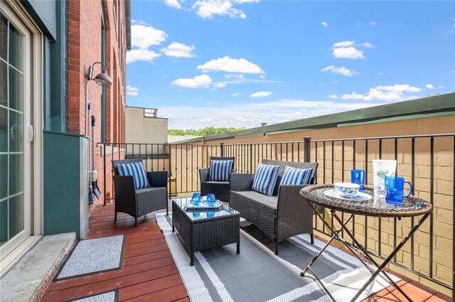 1 Tupperware Dr Unit 115, North Smithfield, RI 02896 - wooden deck with an outdoor hangout area