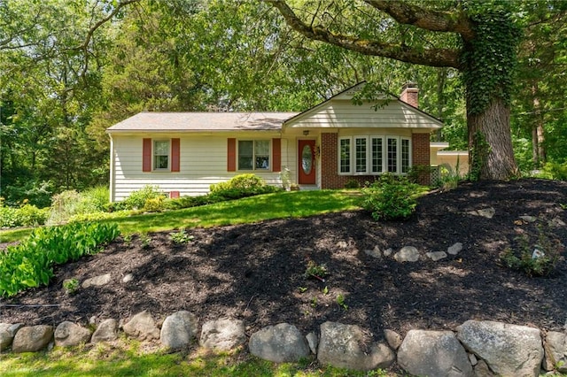 55 Atherton Rd, East Greenwich, RI 02818 - single story home with a chimney, brick siding, and a front lawn