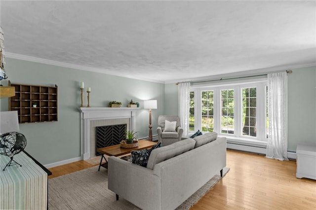 55 Atherton Rd, East Greenwich, RI 02818 - living area with light wood-type flooring, a tile fireplace, and ornamental molding