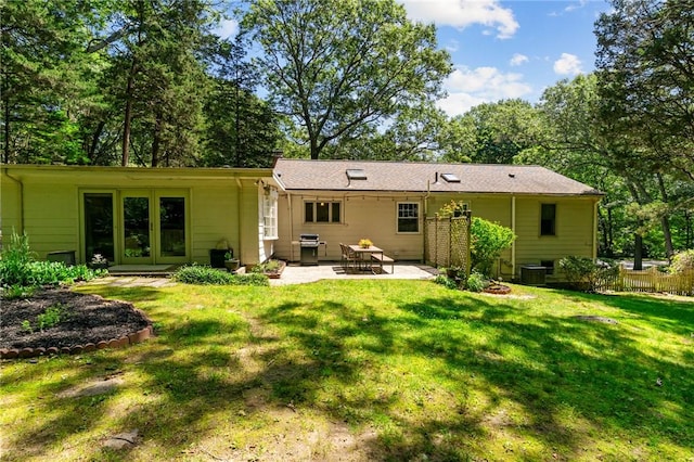 55 Atherton Rd, East Greenwich, RI 02818 - back of house with a patio