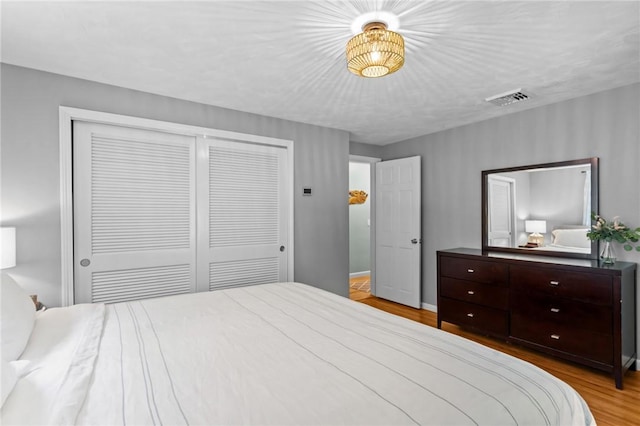 55 Atherton Rd, East Greenwich, RI 02818 - bedroom with a closet and wood finished floors