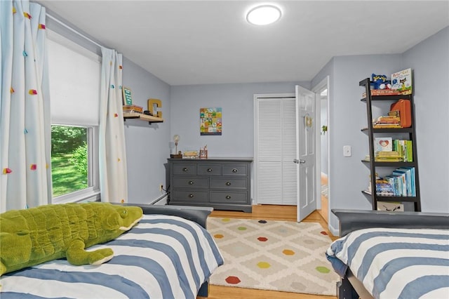 55 Atherton Rd, East Greenwich, RI 02818 - bedroom with light wood-style floors and a closet