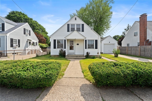 53 Overland Ave, Cranston, RI 02910 - bungalow-style house featuring a garage, an outbuilding, and driveway