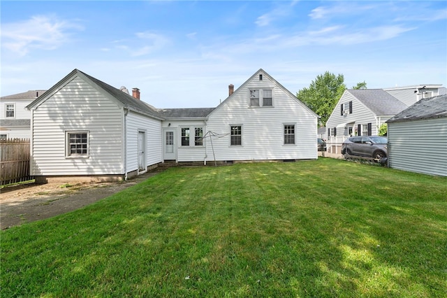 53 Overland Ave, Cranston, RI 02910 - rear view of house with a chimney