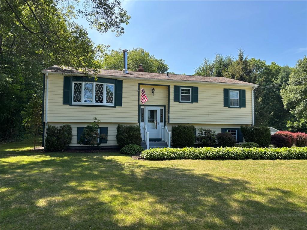 120 Colvintown Rd, Coventry, RI 02816 - bi-level home with a front yard and entry steps