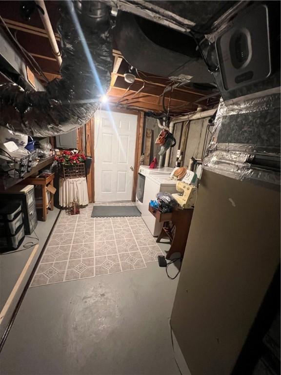 64 Kristee Cir Unit 64, West Warwick, RI 02893 - unfinished below grade area with washing machine and dryer